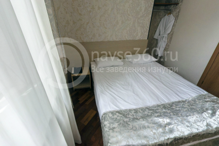 Спальня номера люкс в отеле ИнтернационалЪ